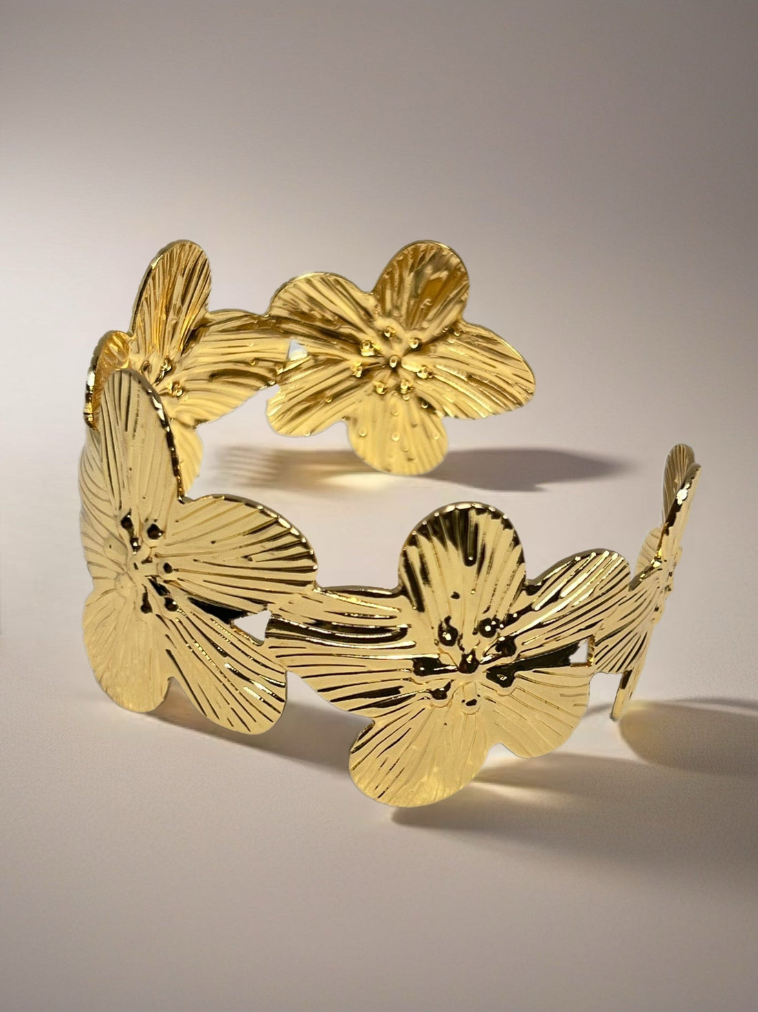 Pulseiras e braceletes douradas
